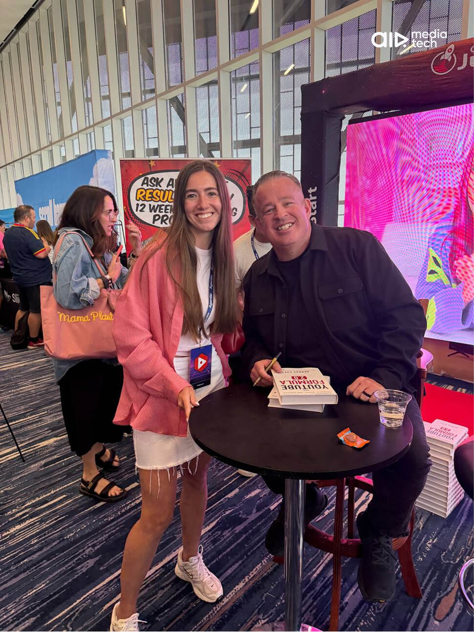 VidSummit 2026 recap: Anastasiia Strelchenko of AIR Media-Tech with Derral Eves at The YouTube Formula 2.0 book signing