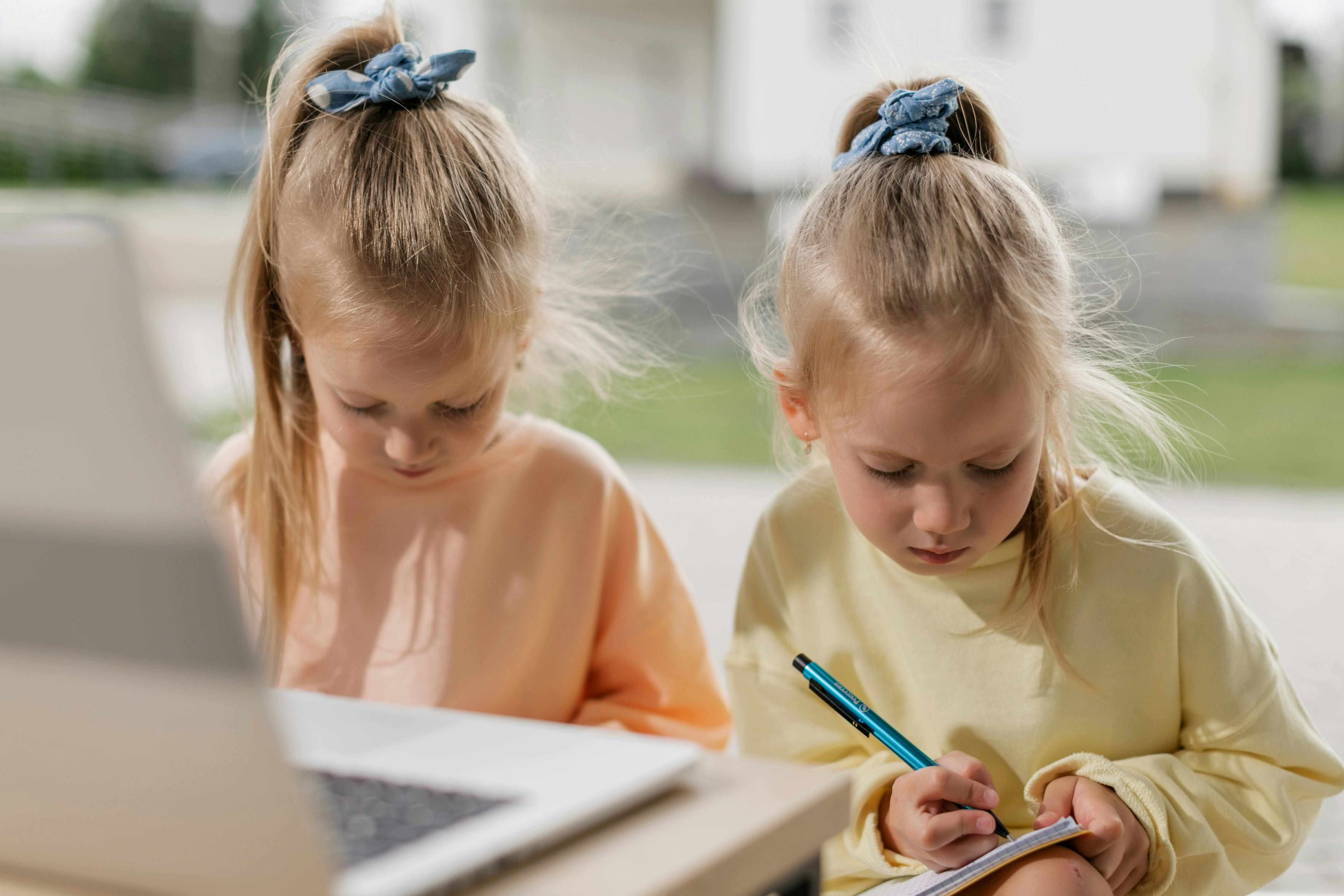 Two kids are watching translated YouTube videos.